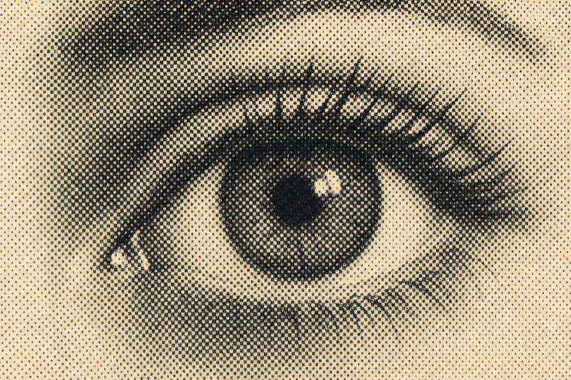 Halftone close-up of an eye from CCTV footage